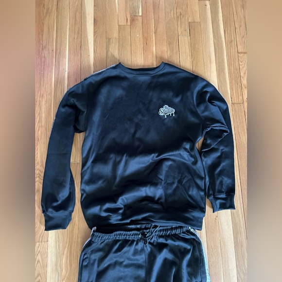 New in the bag black sweatshirt and sweatpants sealed in package.  Sz S, Med, XL - Picture 2 of 13